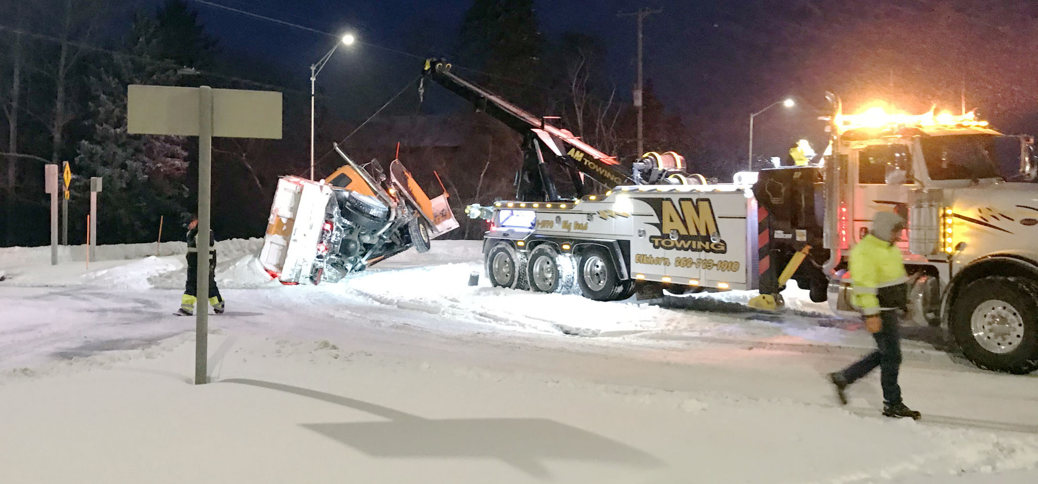 Tow truck loses control of disabled snowplow in Town of Norway